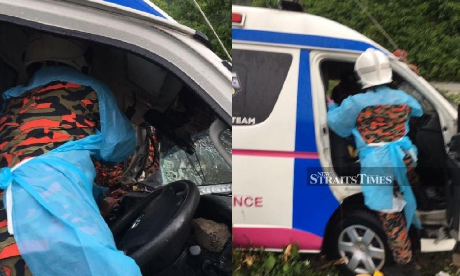 Firemen attend to the injured victim after the crash at Kilometre 285 of the North-South Expressway northbound in Ipoh.  - Pic courtesy of Fire and Rescue Dept.