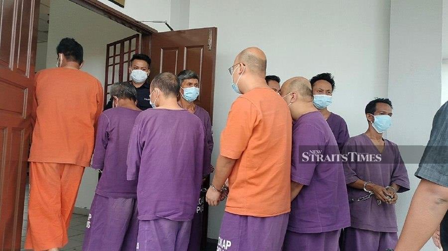 Nine individuals including five foreign nationals were separately charged at the Sessions Court here today for trespassing into the Rimba Teloi Forest Reserve in Sik on Sept 14. - NSTP/NOORAZURA ABDUL RAHMAN