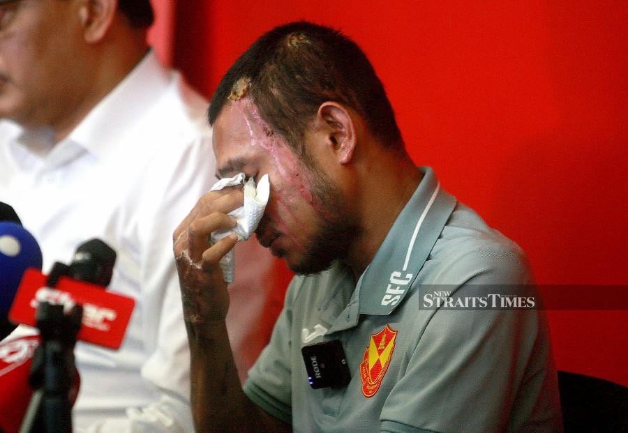 Selangor’s  Faisal Halim shed tears during a press conference at Selangor FC training centre in Shah Alam. - NSTP/FAIZ ANUAR