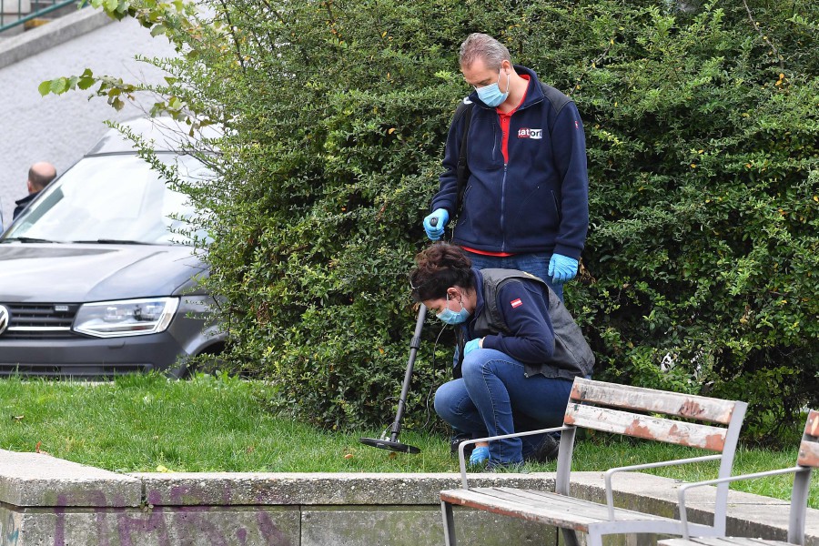 Investigators search at a crime scene in Vienna on November 3, 2020. - AFP pic