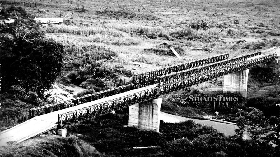  The 92 metre Class 60 (ton) Bailey Bridge at Silabukan River along Lahad Datu-Tungku Road.