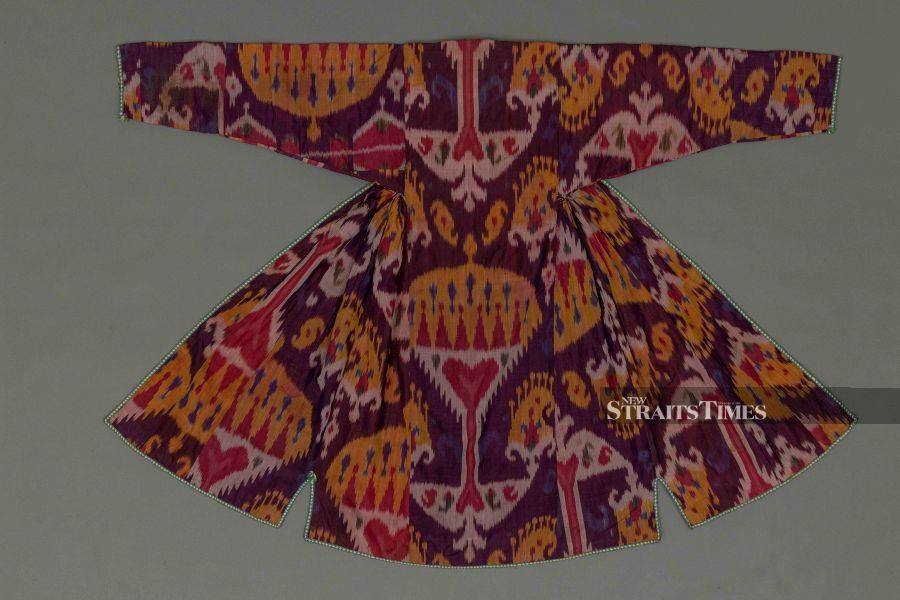  The flamboyant tradition of Central Asia continued into the 19th century with this women's silk robe from Bukhara.