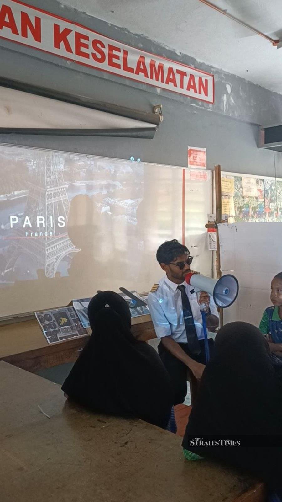  Shawn the 'pilot' taking his students on a flight to Paris, France.