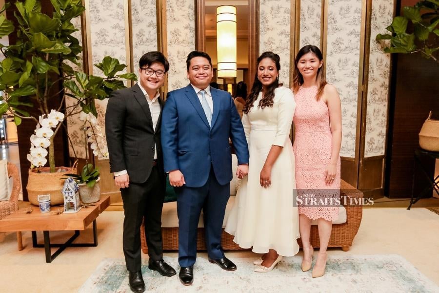  (L to R) Lam, Amir, Aarthi (Amir's wife) and Nicole (Lam's wife) at Amir's wedding reception.