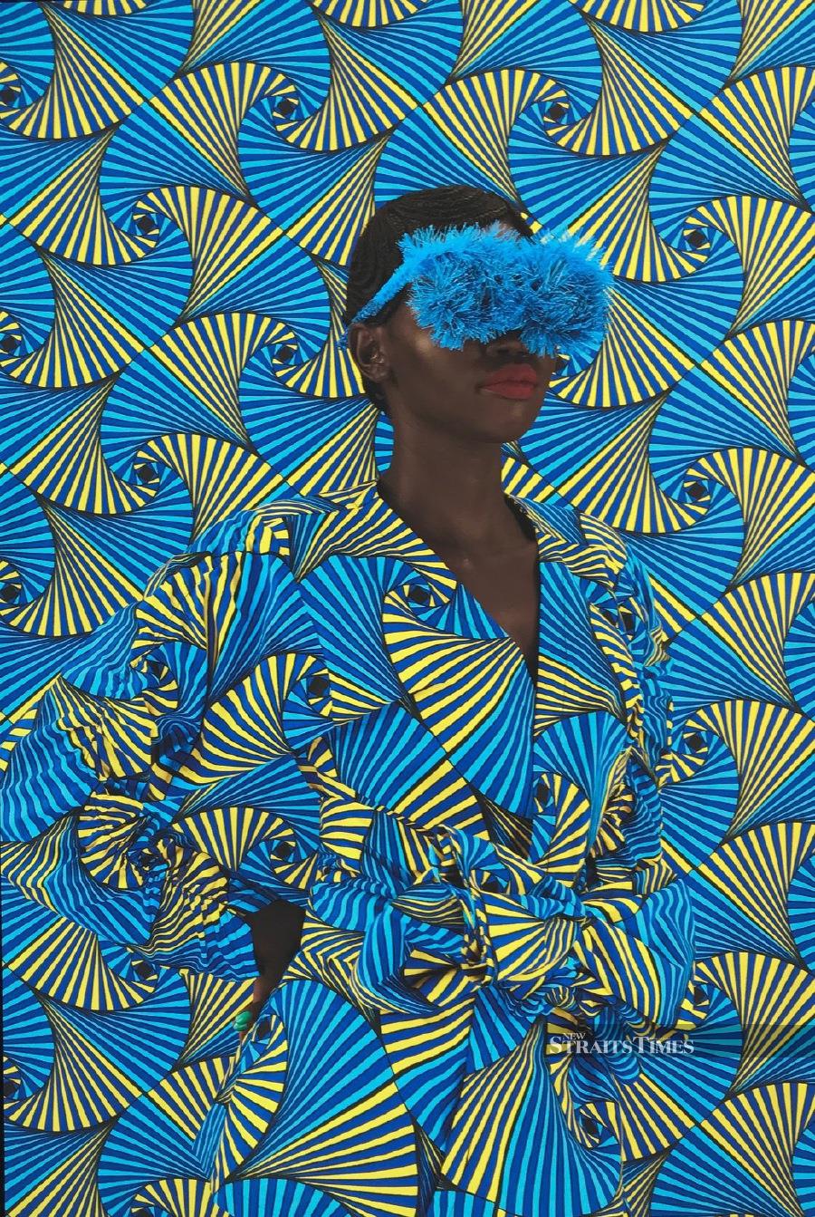  Thandiwe Muriu is a Kenyan with a passion for fabric designs in her striking images.