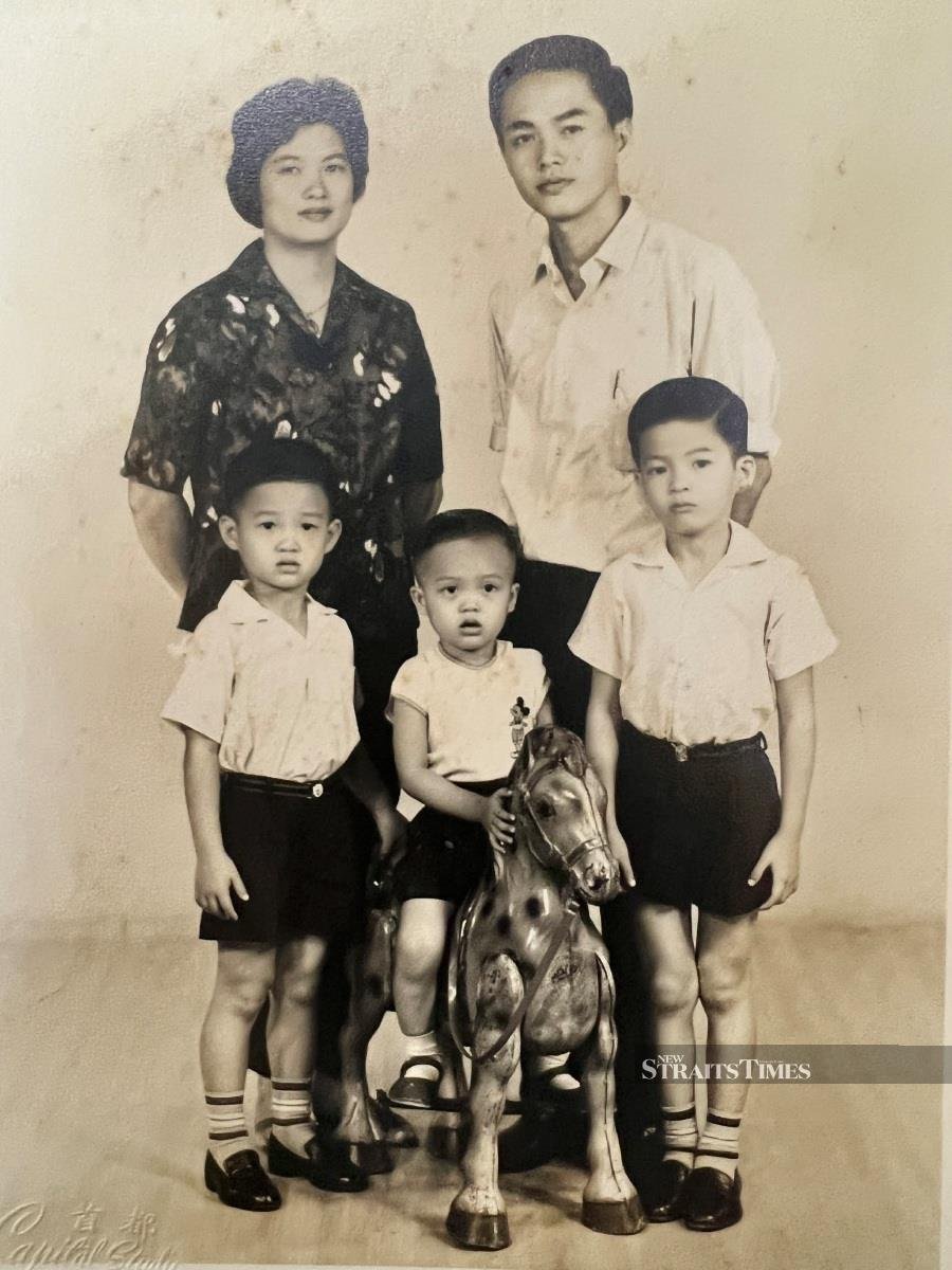  The young couple and their three sons circa 1960s.
