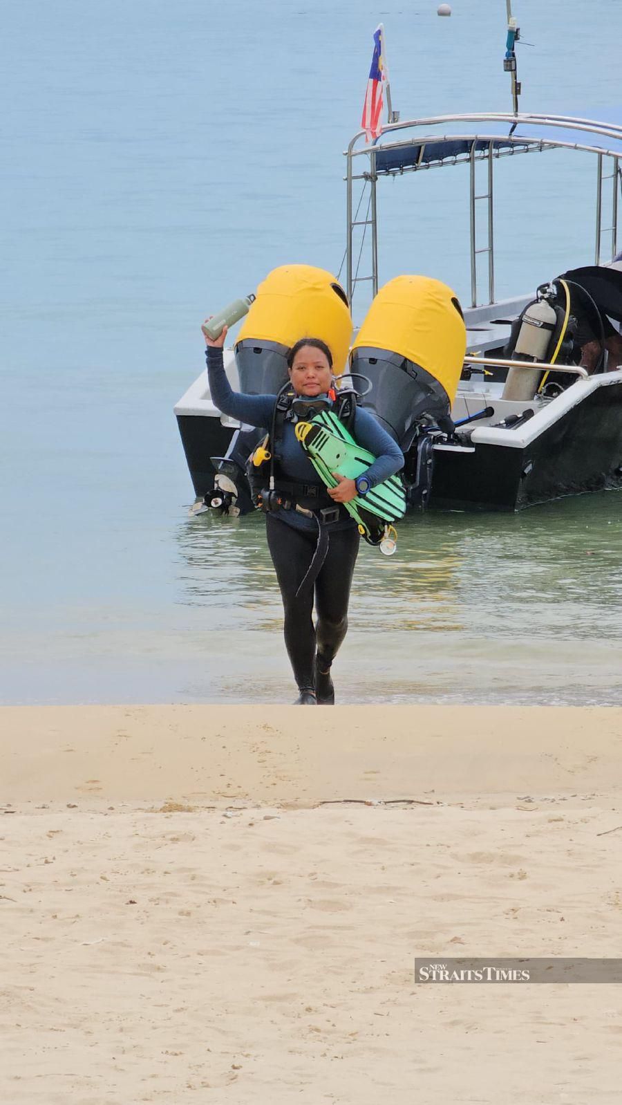  Yana returning from a diving trip in Pulau Tioman.