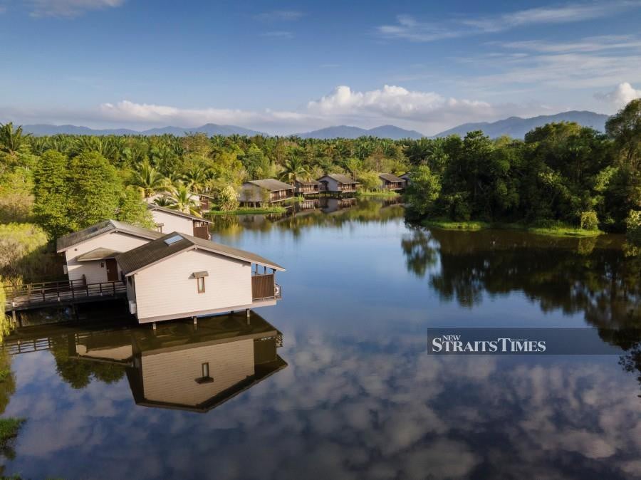  Jala Villa is set on a tranquil lake.