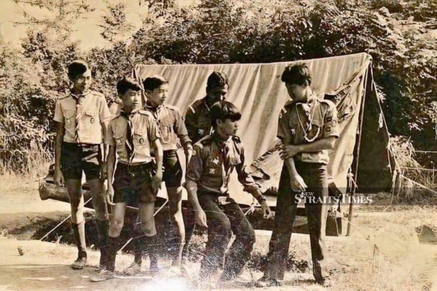  Boyhood camaraderie fostered during scouting days.