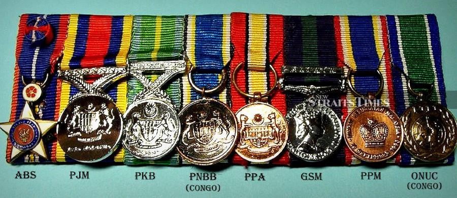  Honours and awards for Lieutenant Colonel Khong Kim Kong.
