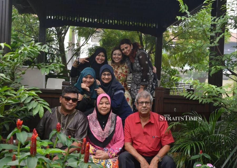  Fadilah with her siblings and parents.