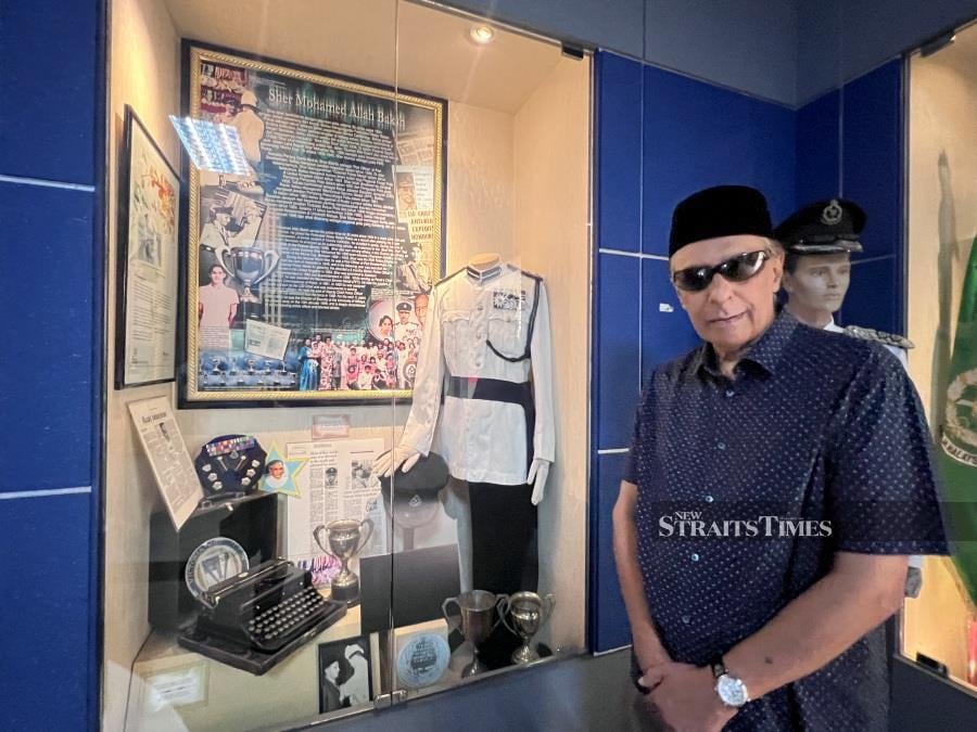  Rafique Sher Mohamed visiting his father's exhibit at the Royal Malaysian Police Museum.