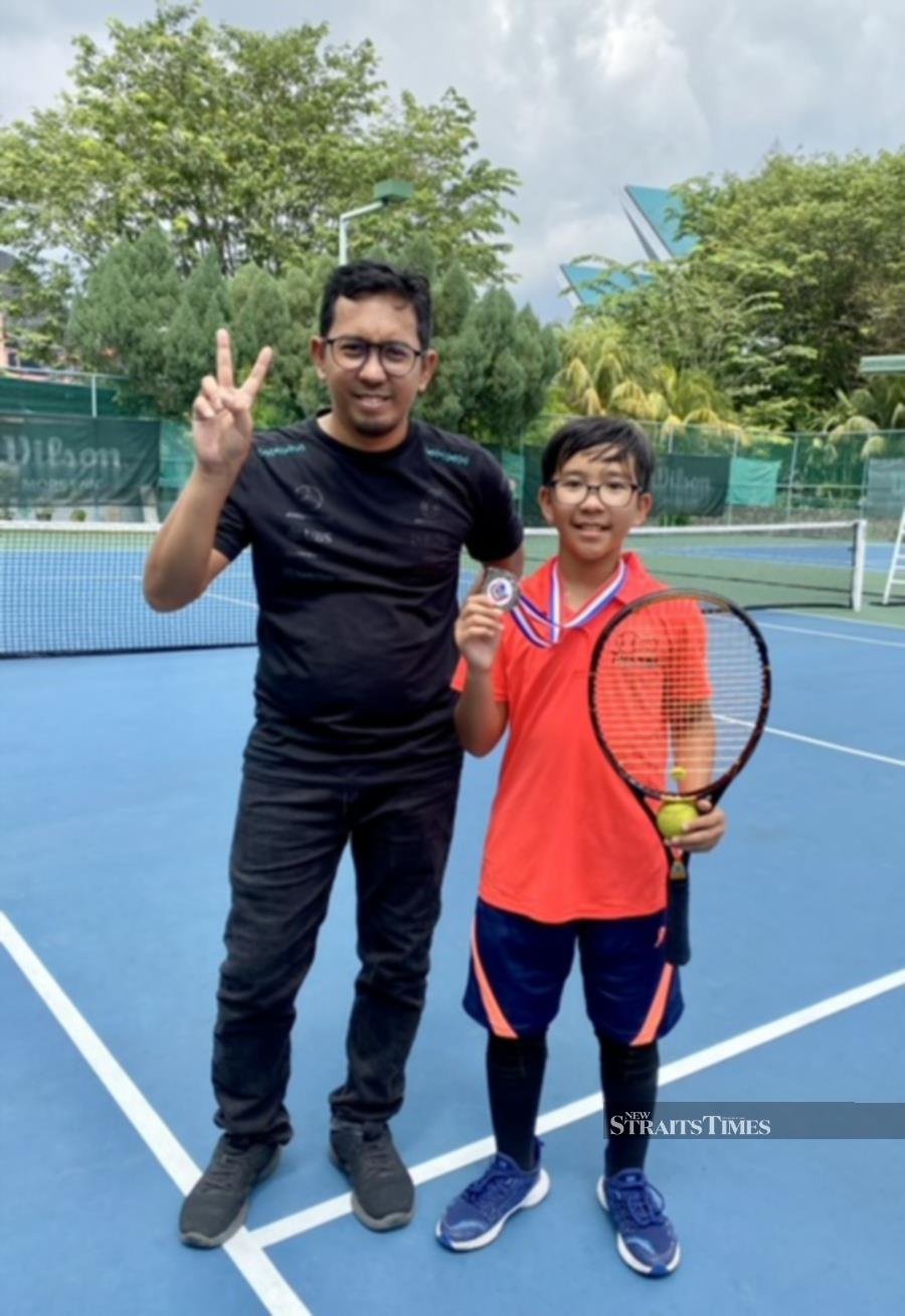  Supporting young Aizaad during his tennis match at the MSSWPKL event.