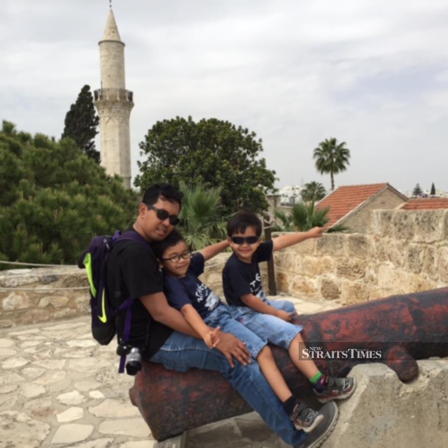  Saiful in Larnaca, Cyprus with his sons.