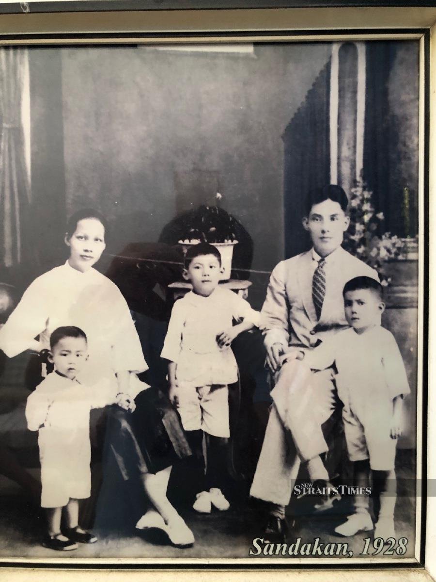  Chin as a 5-year-old with his family in Sandakan.