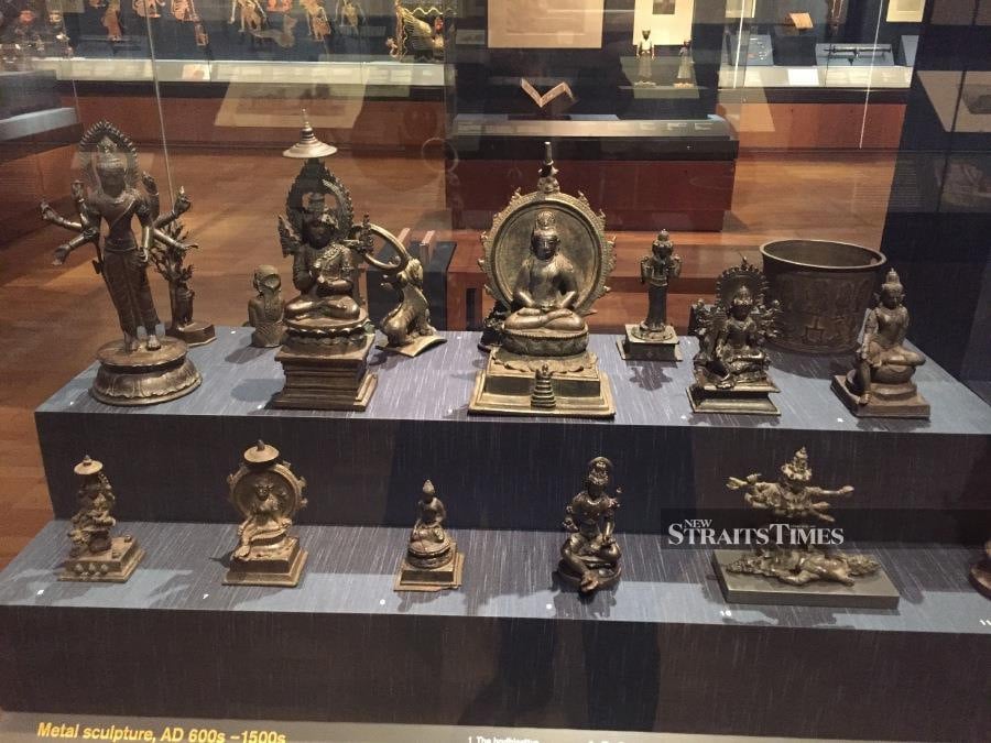  Some of the many Hindu and Buddhist bronzes collected from Java. Most are from about a thousand years ago.