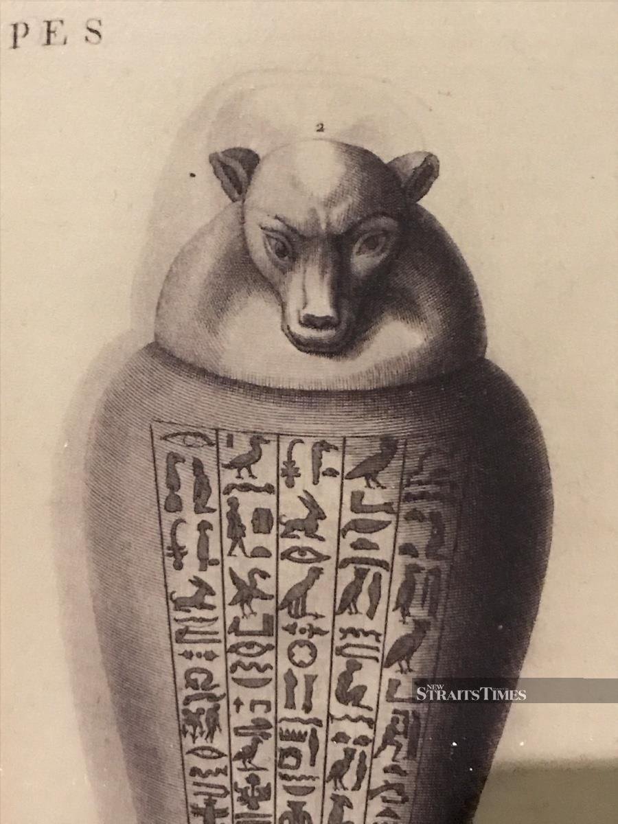  A drawing of the canopic jar does a good job of              depicting hieroglyphs, but in 1720 there was no              translation.