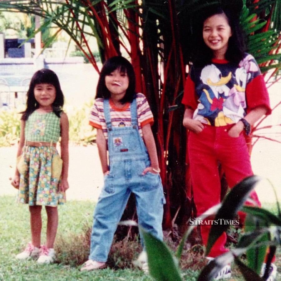  Ng (right) and her two sisters.