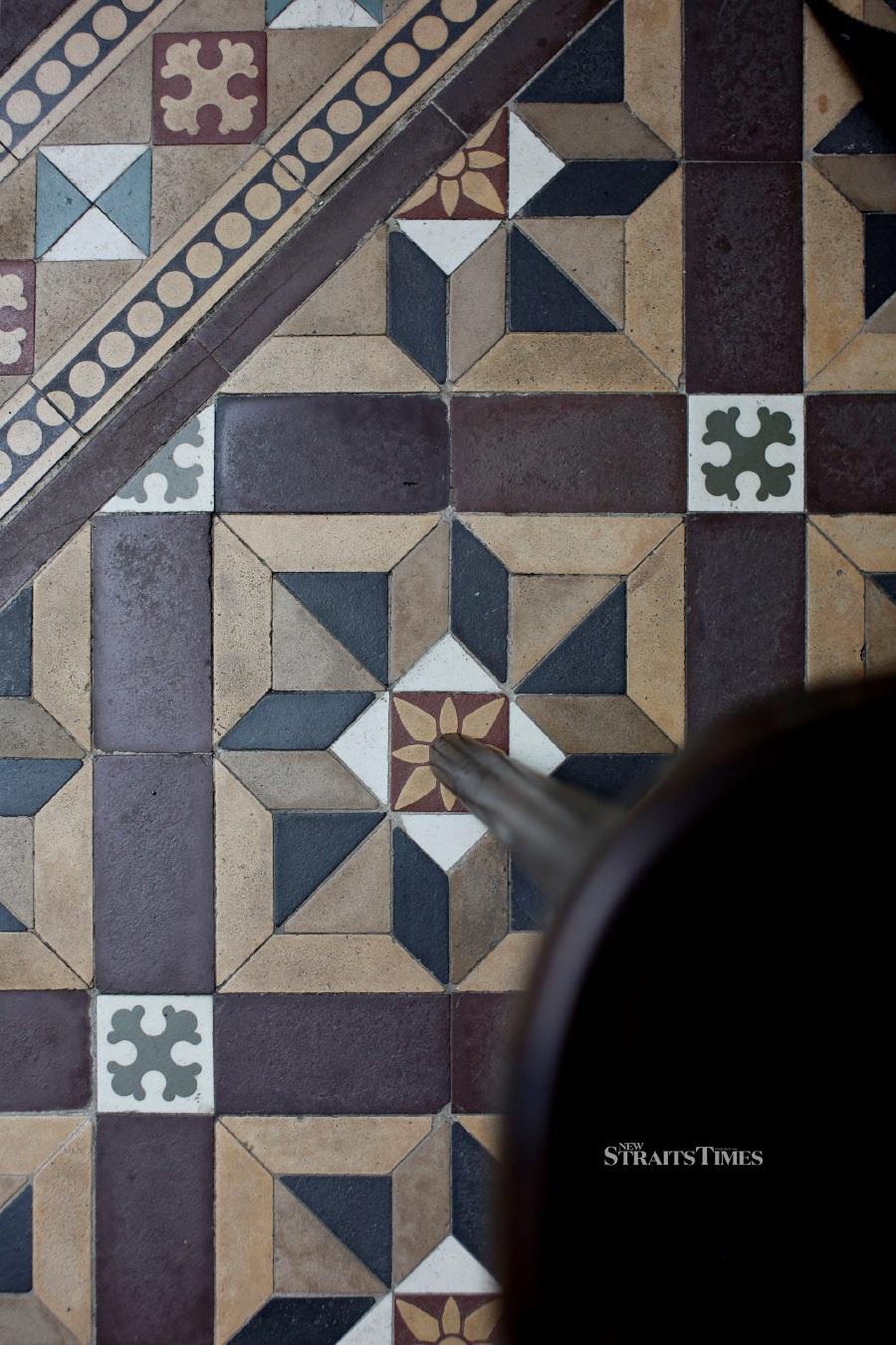  Decorative encaustic tiles imported from Stoke-on-Trent in Staffordshire, England.