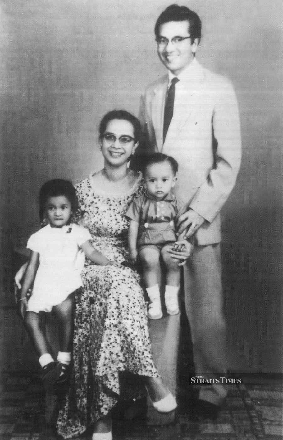  Family portrait at a studio in Alor Setar with Marina and Mirzan.