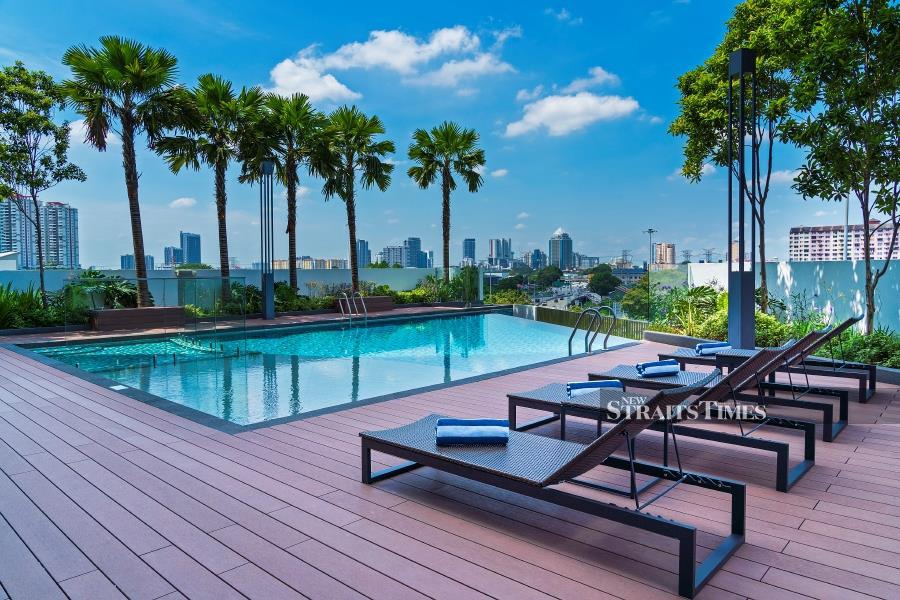 Head to the rooftop swimming pool for a leisurely lap and to enjoy PJ's skyline.