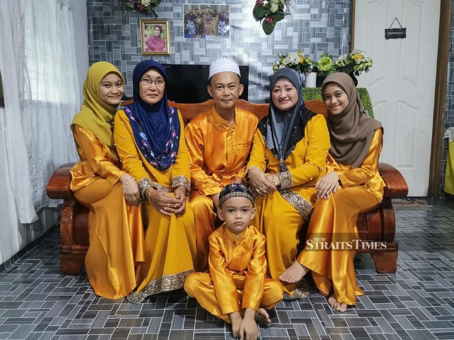  With his beloved family.