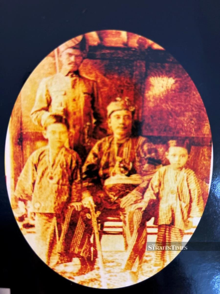  The late Ngah Ibrahim and his sons.