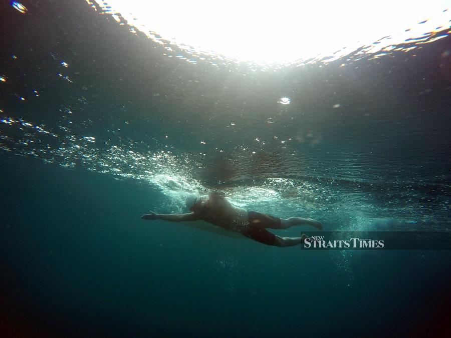  Stunning underwater shot of the swimmer.