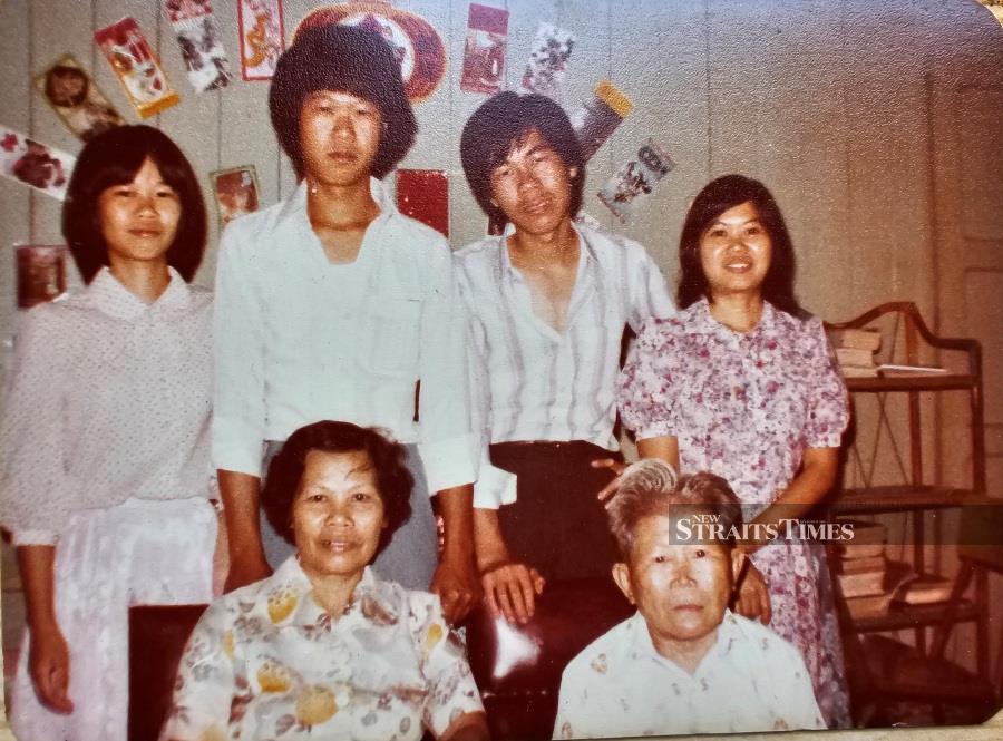  A family photo taken during Chinese New Year sometime in 1980.