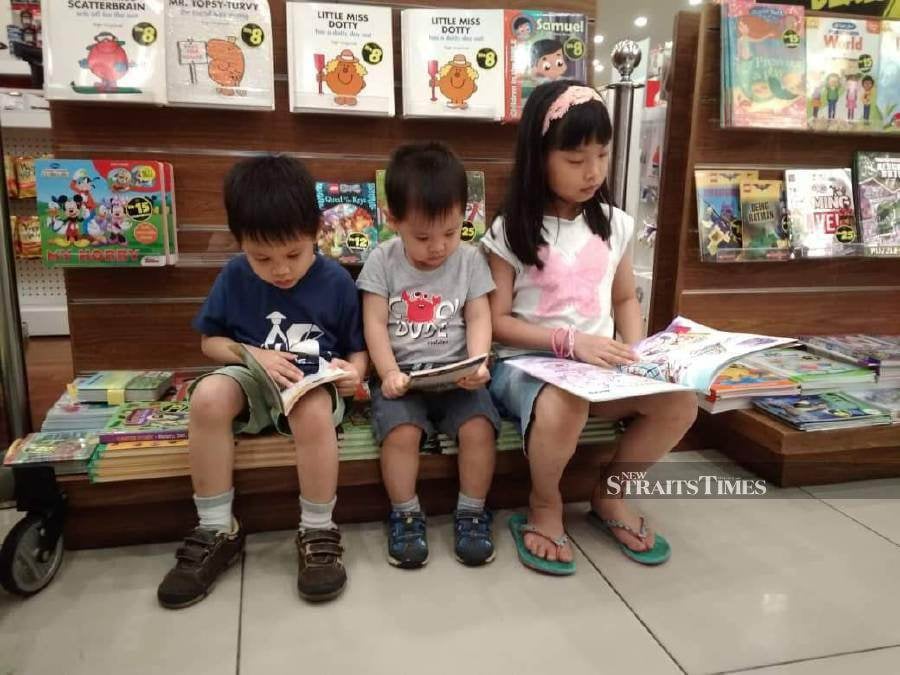  Cheong's love for reading started early. Here on the right, she's only 8 years old.
