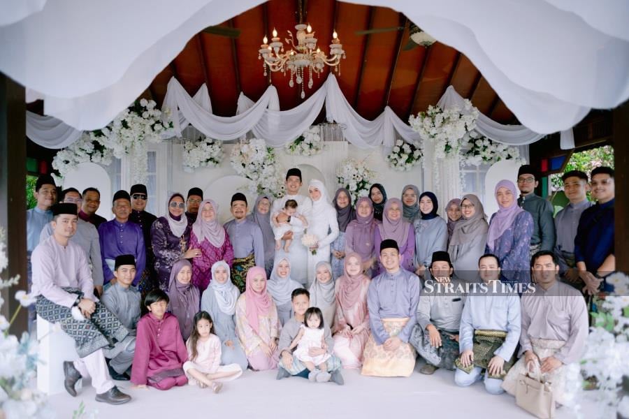  Yusuf on his wedding day last year, surrounded by family and friends.