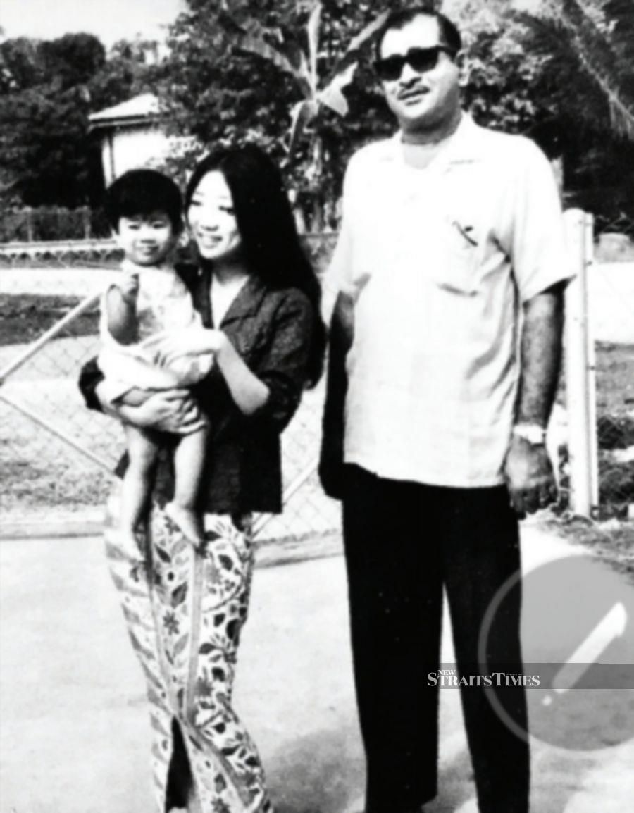  Viji, as a toddler, seen here with her parents in Ipoh.