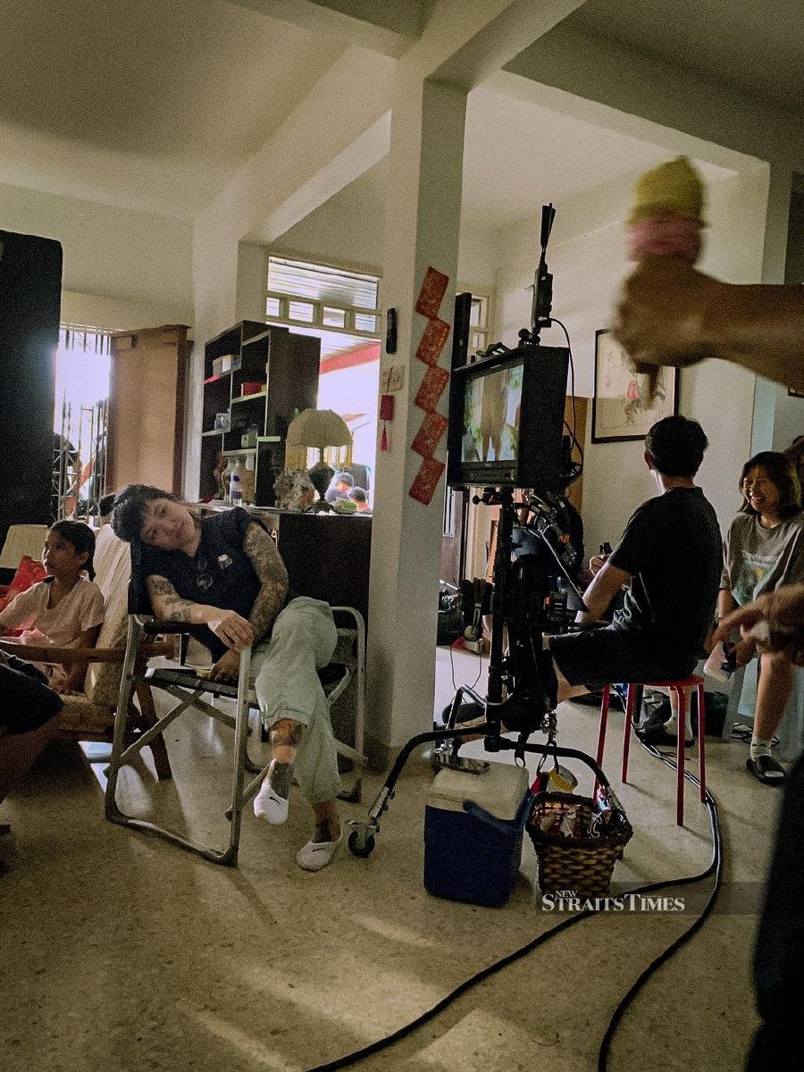 Beatrice on set for a Chinese New Year advertisement for RHB, where her life story comes to life through the lens.