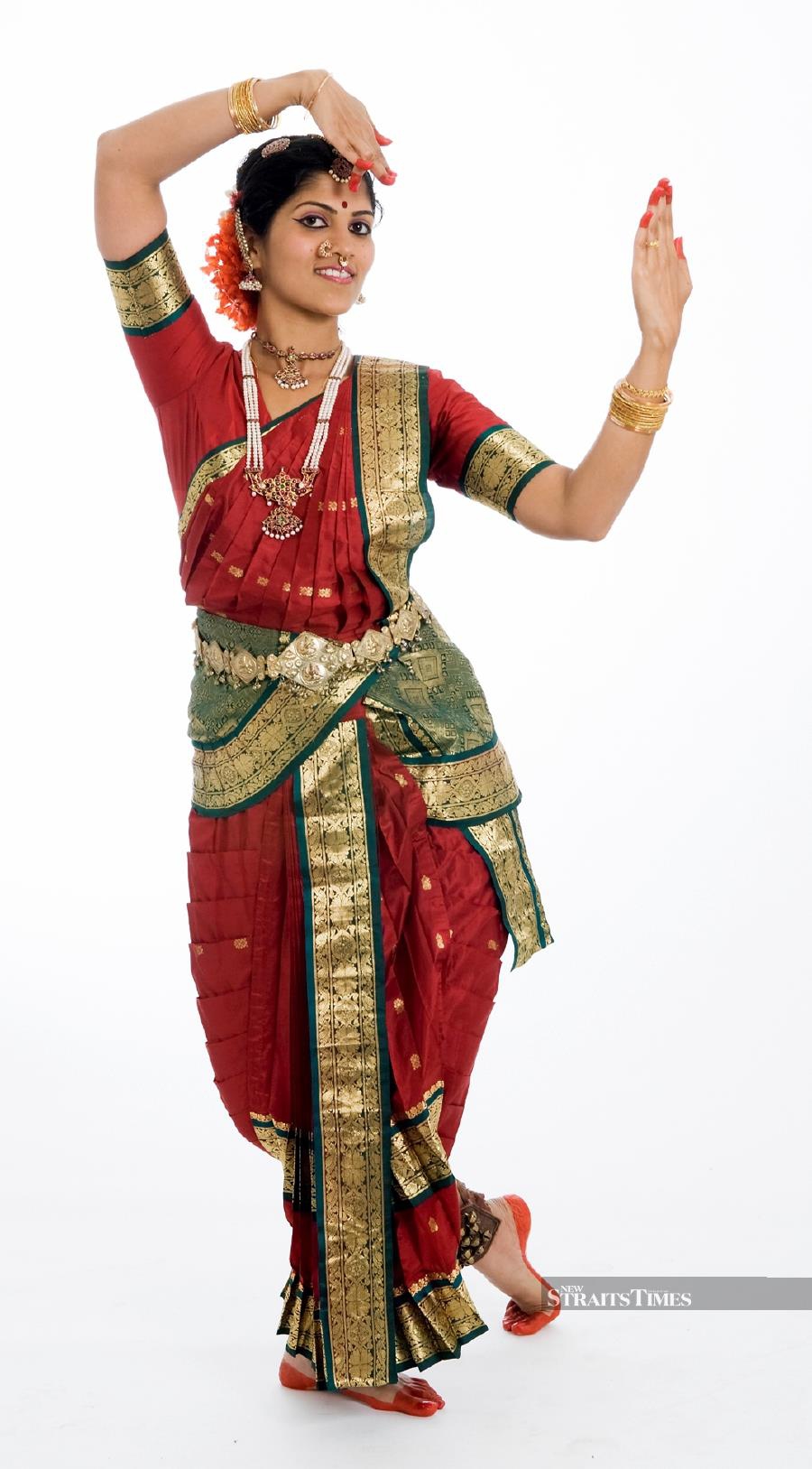  Kavita engaging in Indian dance, a cultural activity that she is passionate about.