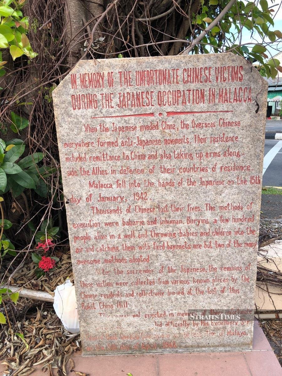  Epitaph in Malacca War memorial park explaining the gruesome death of civilians buried alive in a well and babies killed by Japanese bayonets.