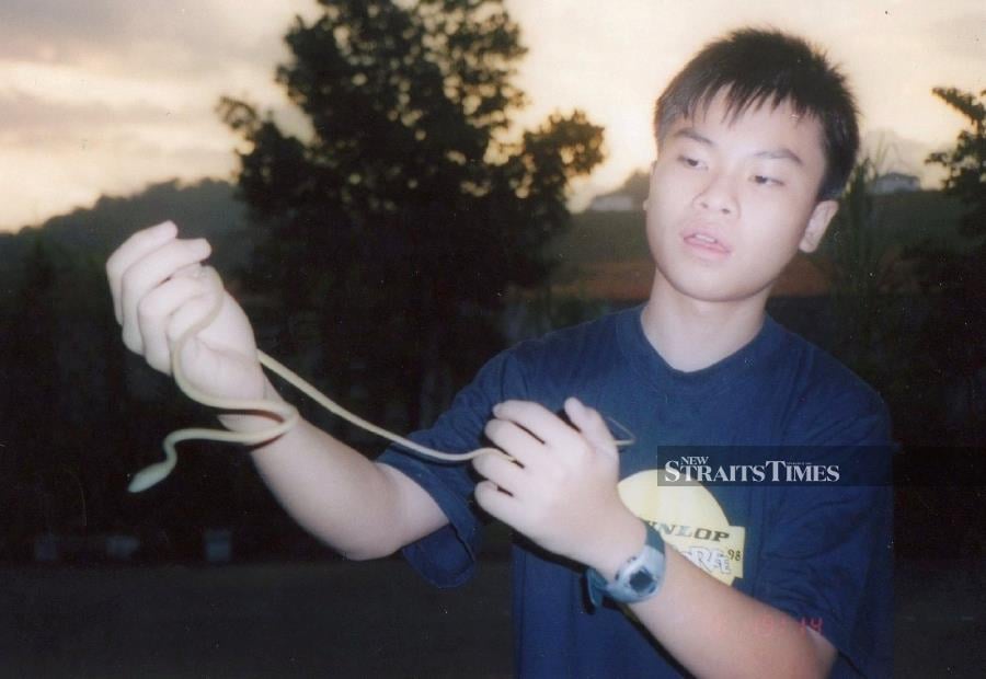  Wong aged 12 with an Oriental vine snake.