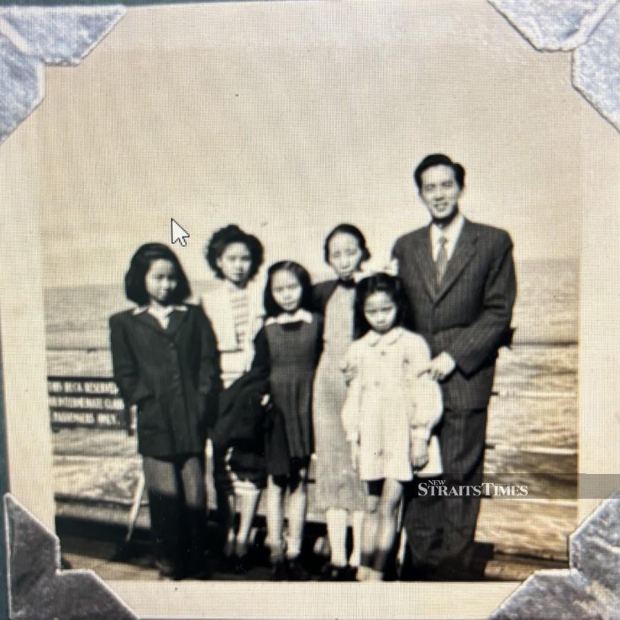  Chow (second from left) with her family during their second voyage to Malaya to escape the Civil War in China.