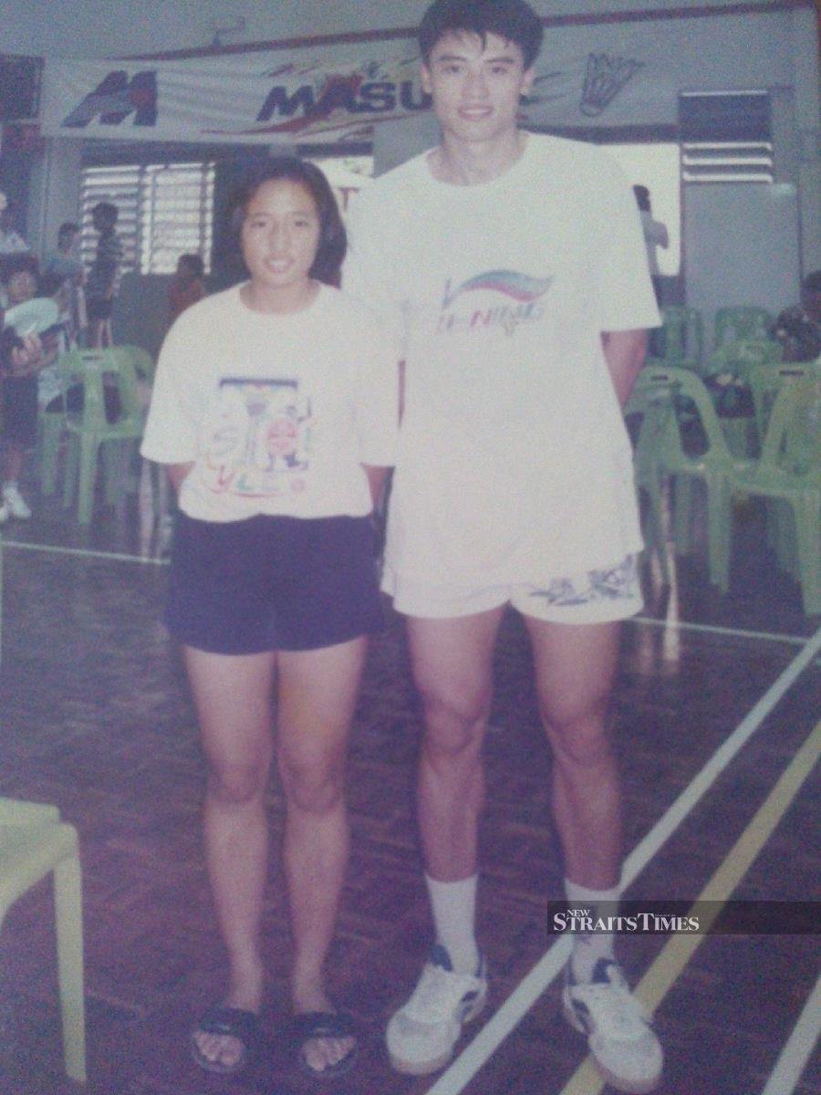  Posing with badminton legend and coach Liu Jun.