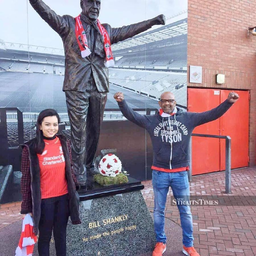  Jake with his daughter at Anfield, the home of his favourite football club, Liverpool FC.