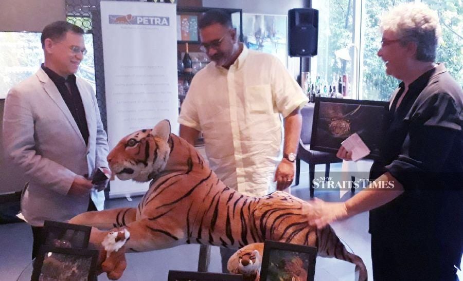 (From left) David Mizan Hashim, Datuk Vinod Sekhar and Lara Ariffin at the joint media event between the Vinod Sekhar Foundation and the Tiger Protection Society of Malaysia (Rimau). The event was held in conjunction with World Wildlife Day, today.