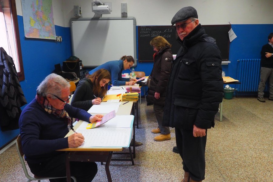  Locals wait to cast their votes in the general elections, in Bologna, Italy, 04 March 2018. General elections are held in Italy on 04 March 2018 with the country's economic situation and migrant influx in the past years believed to dominate the voters' decisions. The three main political contenders in Italy, the right-wing coalition, the ruling Democratic Party and the anti-establishment 5-Star-Movement have all predicted major results for themselves. The final results of the elections are expected to be announced on early 05 March. EPA-EFE pic
