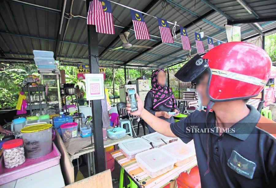 Four million Malaysians, mostly from rural areas, cannot access financial services. - File Pic