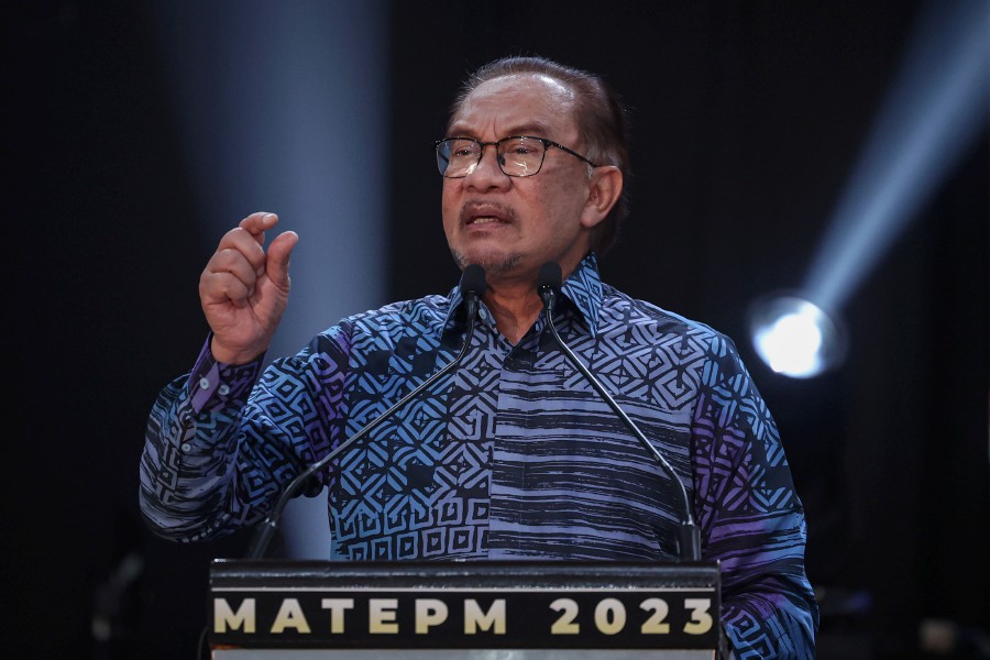 Prime Minister Datuk Seri Anwar Ibrahim delivers his speech during the Tangan Emas Perdana Menteri and the Anugerah Tokoh Mahir Awards Ceremony 2023 in Shah Alam. - BERNAMA PIC