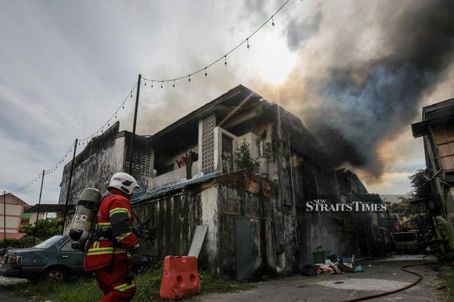 Six double storey shophouses at Jalan Wong Ah Jang were razed in the fire. - NSTP/Luqman Hakim Zubir