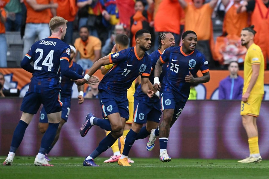 Netherlands' Cody Gakpo celebrates scoring his team's first goal during the UEFA Euro 2024 round of 16 football match between Romania and the Netherlands at the Munich Football Arena in Munich. - AFP PIC