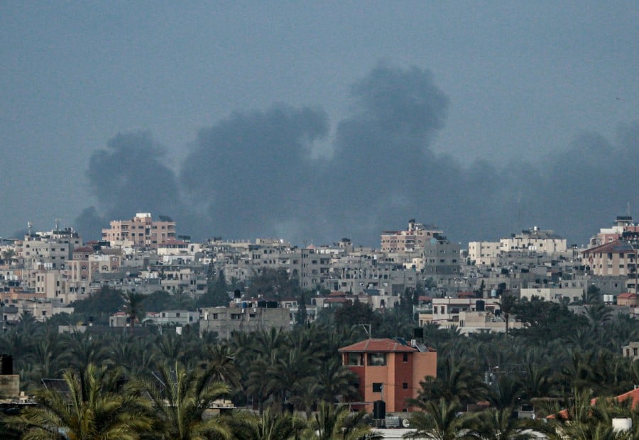  Smoke billows following Israeli bombardment north of Nuseirat in the central Gaza Strip. - AFP PIC