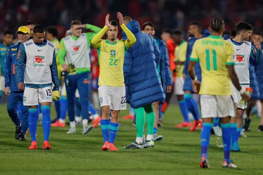 Brazil's forward Gabriel Martinelli (C) celebrates at the end of the 2026 FIFA World Cup South American qualifiers football match between Chile and Brazil, at the National stadium in Santiago. - AFP PIC