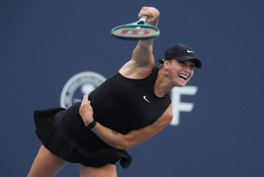 Aryna Sabalenka serves against Paula Badosa of Spain during their match on day 7 of the Miami Open at Hard Rock Stadium in Miami Gardens, Florida. - AFP PIC