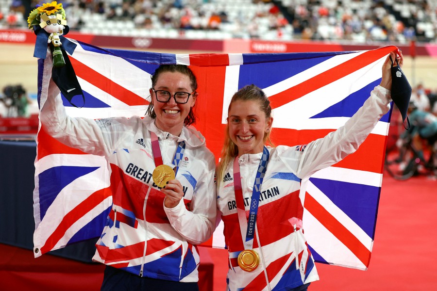  Laura Kenny and Katie Archibald of Britain celebrate on the podium. -REUTERS PIC