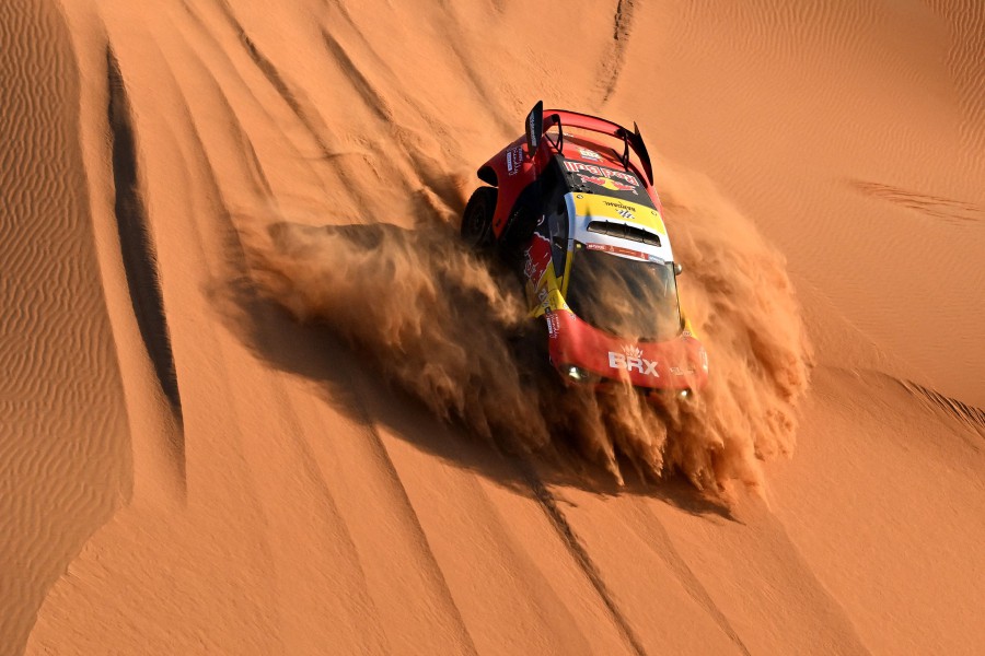  Bahrain Raid Xtreme's French driver Sebastien Loeb and Belgian co-driver Fabian Lurquin steer their car in the dunes during the second part of the 48h chrono stage between Shubaytah and Shubaytah, as part of the Dakar rally 2024. --AFP PIC
